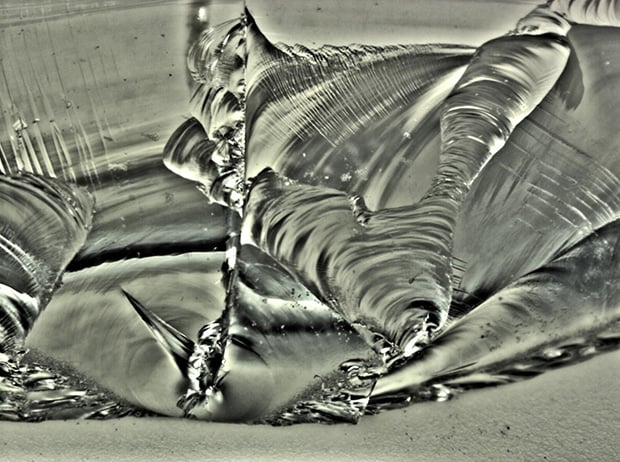 Glass fragment (50×)