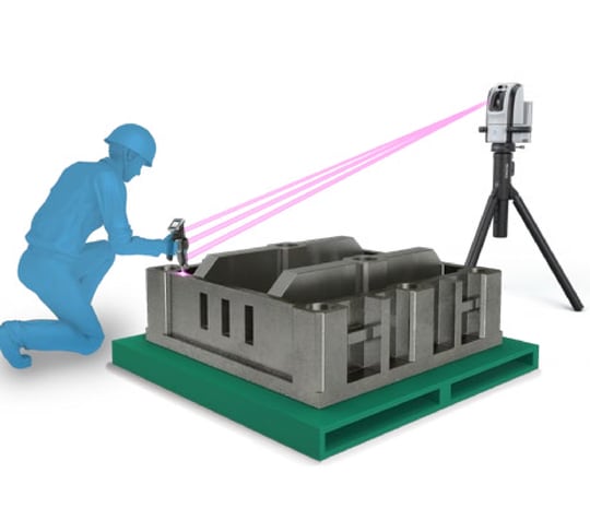 One person touches the target with the probe while the main unit on a tripod tracks it