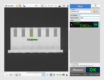 The measurement screen shows straight lines detected on the reflected image, with the measured distance and an OK judgment.