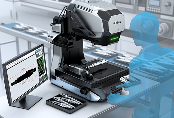 In the lab, the screen traces a part's profile in detail next to trays of sample parts.