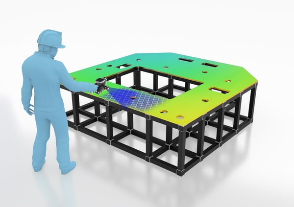 A single worker scans a large frame with the laser-scanning probe and no gaps in the data.