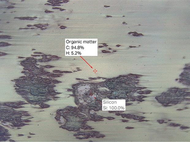 Large targets are too big to load on an SEM, but the EA-300 can analyze these targets as-is and with no vacuum required. The detection of calcium indicates that the particles are from paper. The detection of silicon indicates that the particles are from toner.