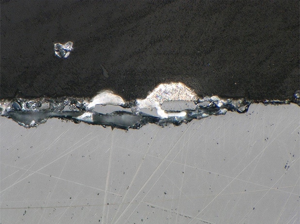 Observation of defects on a cross section: Coaxial illumination (1000x)