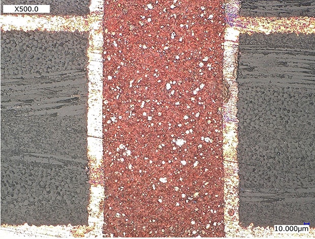 Observation of discolored areas on a PCB cross section (500x)