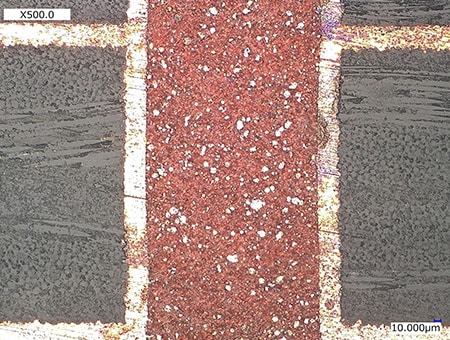 Observation of discolored areas on a PCB cross section (500x)