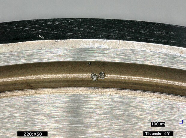 Observation of damage on the race of the bearing (50x)